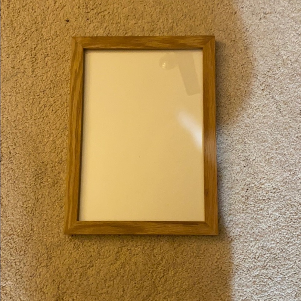8. 5x 11 light wood frame.